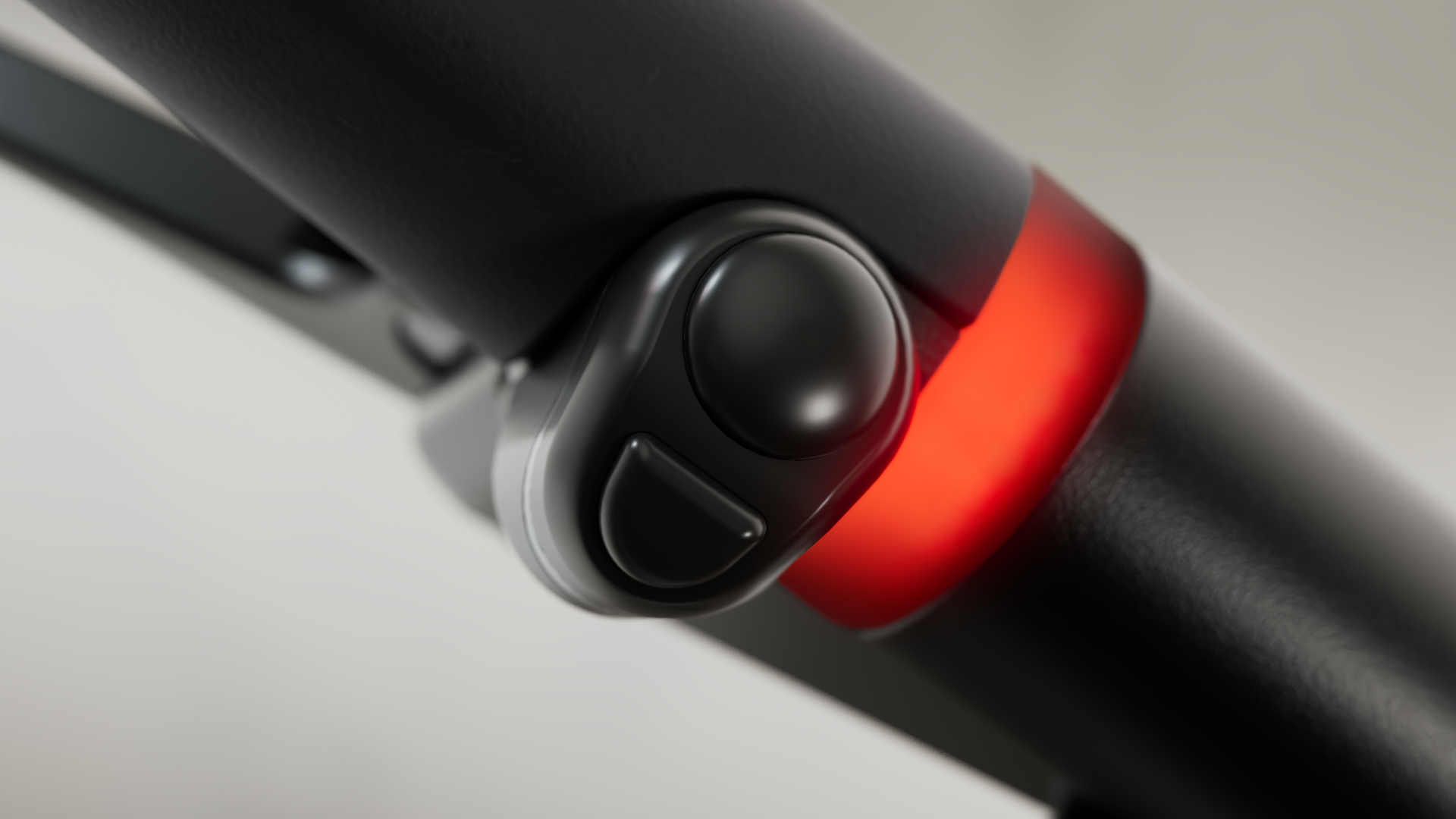 Close-up van een stuurknop met rode lichtring